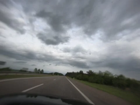 Fast trip with rainy clouds and grey sky Stock Footage 145016876