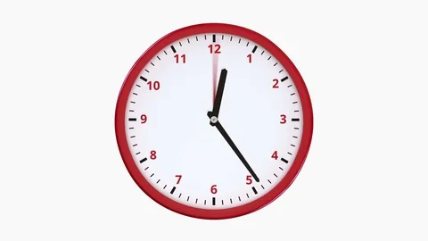 Fast turning clock hands on round red clock. 库存影片 77337066