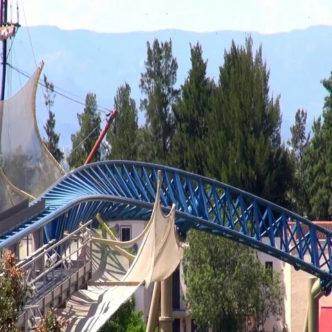 Fast turning roller coaster ride on an amusement park Video stock 69734480