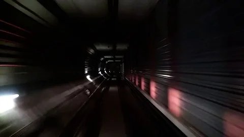 Fast underground train riding in a tunnel of the modern city Stock Footage 100549718
