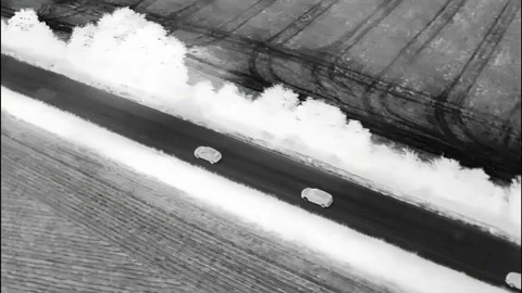 Fast Vehicles Being Chased Using a Thermal Imaging Camera From The Air Video stock 159705208