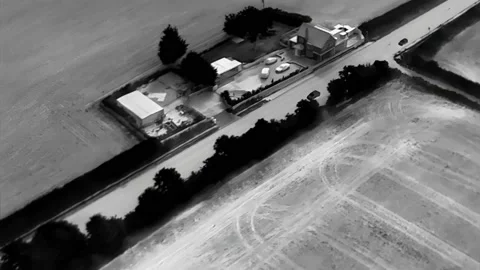 Fast Vehicles Being Chased Using a Thermal Imaging Camera From A Drone Video stock 159705615