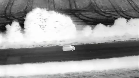 Fast Vehicles Being Chased Using a Thermal Imaging Camera From The Air Video stock 159705633