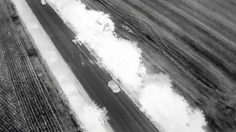 Fast Vehicles Being Chased Using a Thermal Imaging Camera From The Air Video stock 159705665