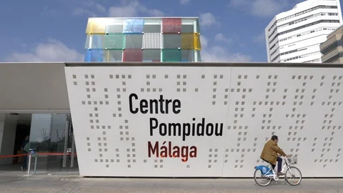 Fast vertical pan of Centre Pompidou facade and lettering in Malaga city Stock Footage 103838067