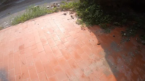 Fast video from below of a destroyed bicycle abandoned in an industrial compl Stock Footage 114647555