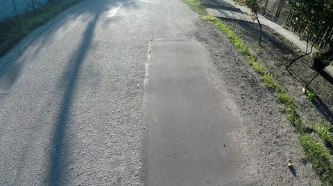 Fast walking on the road, view from the top, camera gopro Stock Footage 127865800