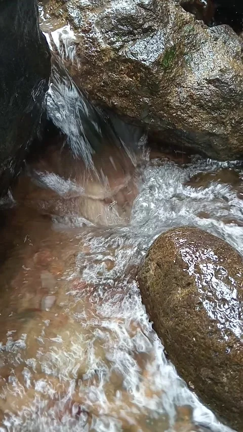 Fast Water Flow Between Rocks Close Up Stream Motion Detail Stock Footage 330582731