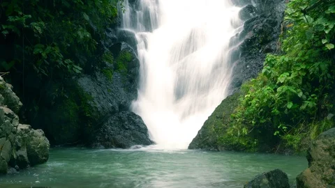 Fast waterfall flowing splash in the forest Stock Footage 94732036