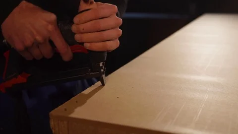 Fast work with a staple gun Stock Footage 85420974