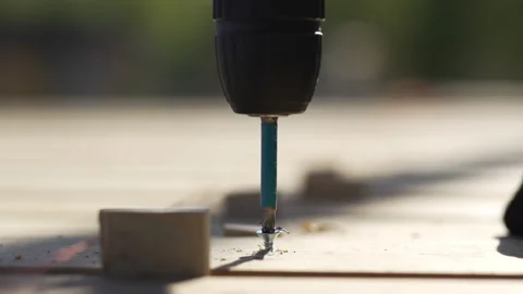 Fastener driving machine quickly spirals coach bolt Stock Footage 271328836