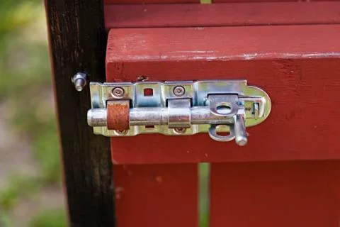 A fastener mounted on the gate Stock Photos