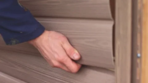 The fastening of the siding Stock Footage 80209933