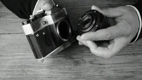 Fastens lens from retro camera Stock Footage 112922941