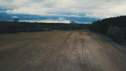 Faster drone flight over the field Stock Footage 129451058