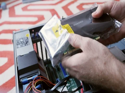 Fastmotion Man upgrading workstation computer GPU NVidia Quadra Stock Footage 69983929