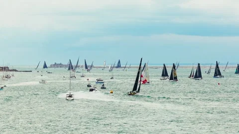 Fastnet Race Fleet Sailing Between The Needles and Hurst Castle Stock Footage 336278902