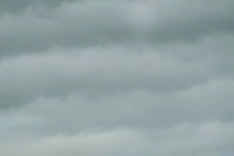 Fat bluish cloud continuously floats . Stock Photos