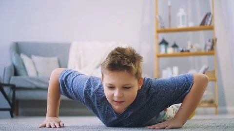 Fat boy doing exercises in the hall Stock Footage 104276770