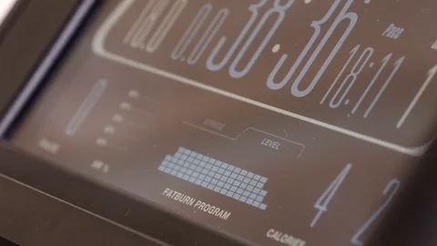Fat burn preset training program on display of elliptical machine console Stock Footage 75812083