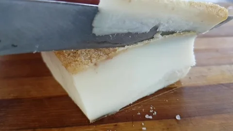 Fat, cut with a knife, slow-motion Stock Footage 95578892