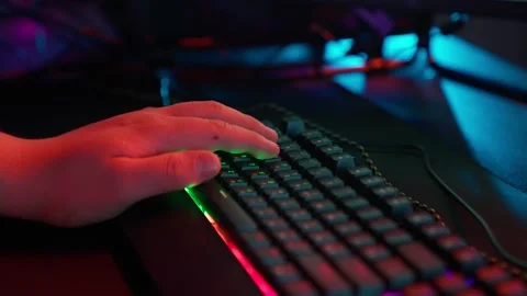 The Fat gamer plays at the computer and eats a burger and pizza. A Thick program Stock Footage 220424222