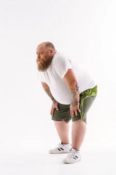 Fat guy cannot workout Foto stock