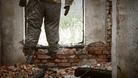 Fat hangman in the ruins (lower trunk) Video stock 77968474