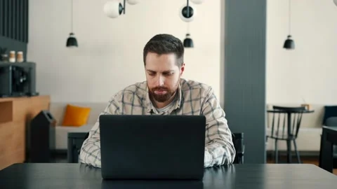 A fat IT guy writes a program, codes a mobile application, possibly a hacker Stock Footage 173476344