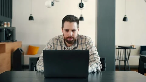 A fat IT guy writes a program, codes a mobile application, possibly a hacker Stock Footage 173477114