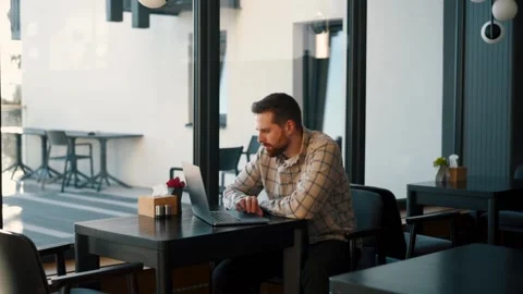 A fat IT guy writes a program, codes a mobile application, possibly a hacker Stock Footage 173478418