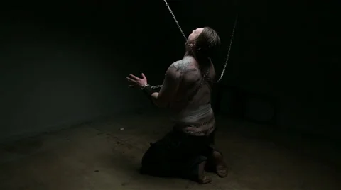 Fat man in chains on the floor Stock Footage 59516777