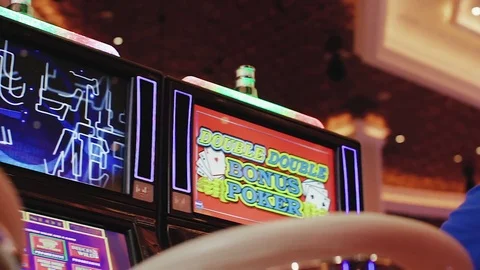 Fat Man Playing On A Slot Machine Inside A Casino Stock Footage 71128480