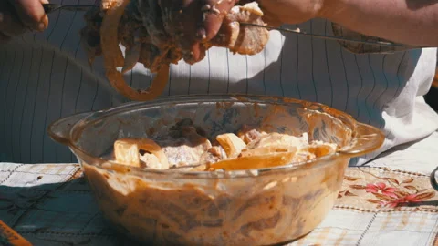 Fat Man Puts the Pickled Meat on a Skewer for a Shish Kebab Stock Footage 88525740
