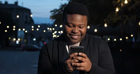 Fat man typing and smiling. Stock Footage 121302920