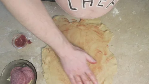 Fat man with word chef written on his stomach makes pizza. Parody and humor Vidéo 152956944