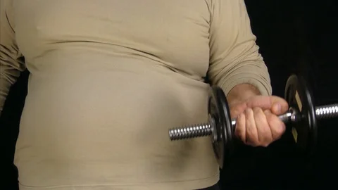 Fat Man Working Out With Tiny Dumbbell Vídeo Stock 100510800