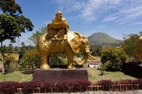 Fat monk on elephant statue in complex Pagoda Ekayana fat monk on elephant... Fotos Stock