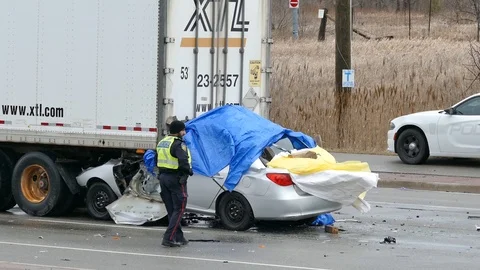 Fatal car crash read-end semi truck with tarp - 24fps 1080p Stock Footage
