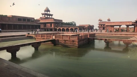 Fatehpur Sikri, India - November 15, 2019: Abandoned city tourists take pictures Stock Footage