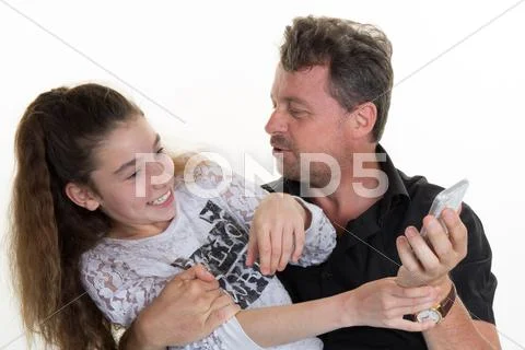 Father and daughter having fun isolated on white Stock Photos