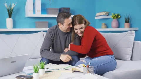 Father and daughter study happily together. Stock Footage 235374236