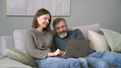 Father And Daughter Using Computer at Home Stock Footage 153806469