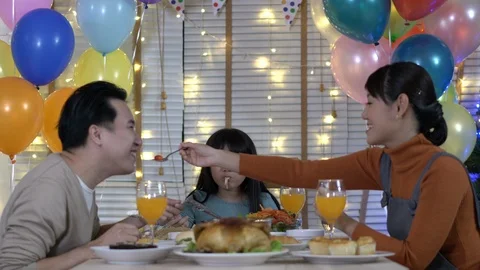 Father and mother dinner with daughters birthday party together. Stock Footage 113693053