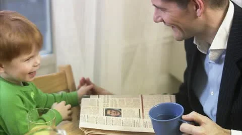 Father and son at breakfast Stock Footage 11290921