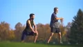 The father and a son doing exercise outdoor 4k or 4k+ Resolution