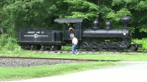Father and son exploring an antique train in Kent, Connecticut Stock Footage