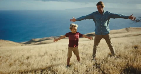 Father and Son Feeling the Wind Stock Footage 150152379