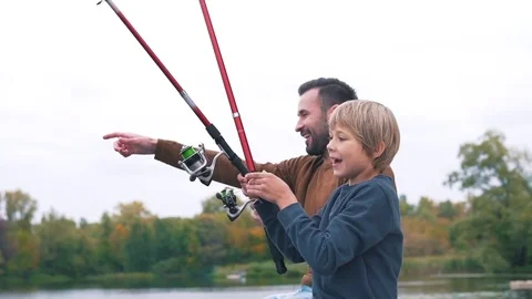 Father and son have fun on the fishing Stock-Footage 80840185