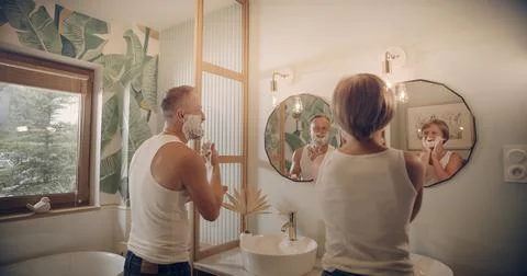 Father and son having fun shaving. Quality time with kid Stock Photos